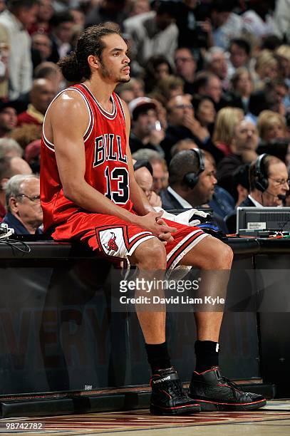 Joakim Noah of the Chicago Bulls sits near the sideline during the game against the Cleveland Cavaliers in Game Five of the Eastern Conference...