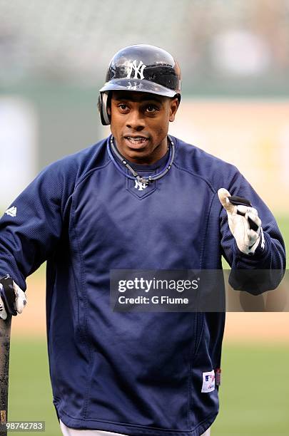 Curtis Granderson of the New York Yankees warms up before the game against the Baltimore Orioles at Camden Yards on April 27, 2010 in Baltimore,...