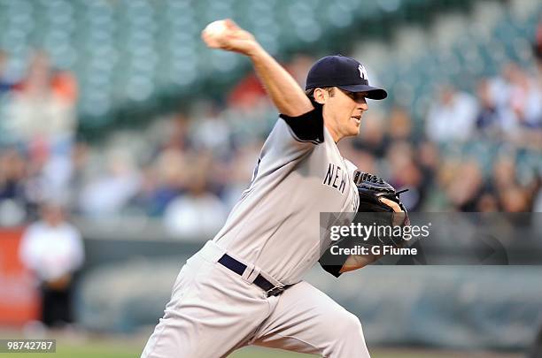 Phil Hughes of the New York Yankees pitches against the Baltimore Orioles at Camden Yards on April 27, 2010 in Baltimore, Maryland.