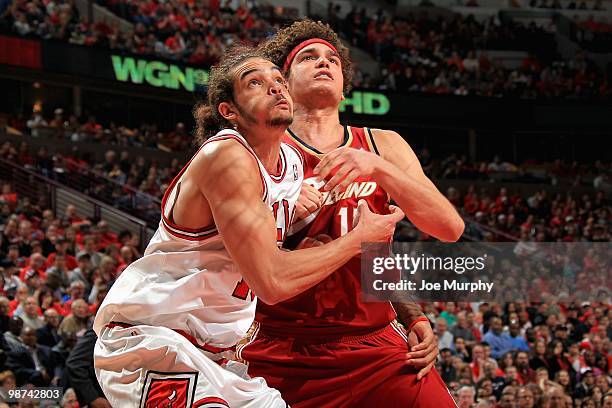 Joakim Noah of the Chicago Bulls battles for position against Anderson Varejao of the Cleveland Cavaliers in Game Four of the Eastern Conference...