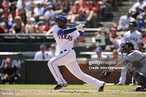 Elvis Andrus of the Texas Rangers bats during the game against the Detroit Tigers at Rangers Ballpark in Arlington in Arlington, Texas on Sunday,...