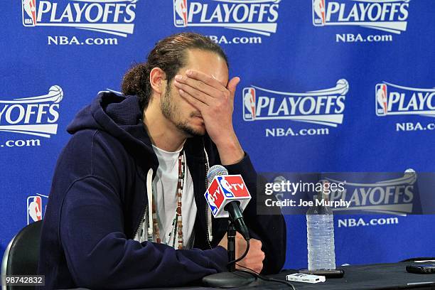 Joakim Noah of the Chicago Bulls rubs his face after the Bulls lost to the Cleveland Cavaliers in Game Four of the Eastern Conference Quarters during...