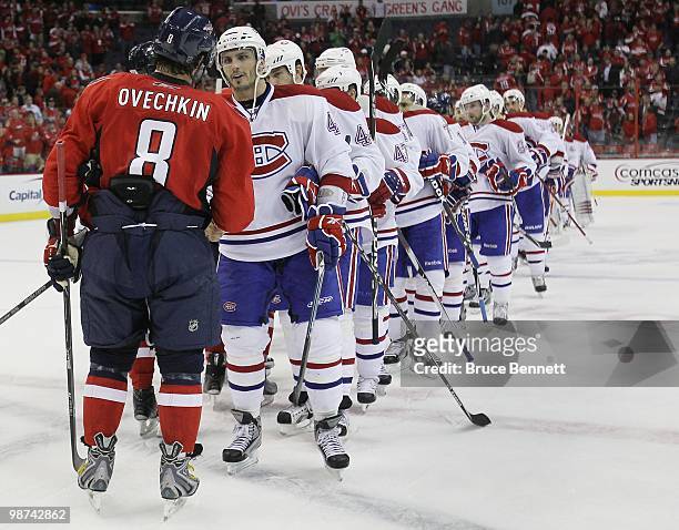 The Montreal Canadiens and the Washington Capitals shake hands following Game Seven of the Eastern Conference Quarterfinals during the 2010 NHL...
