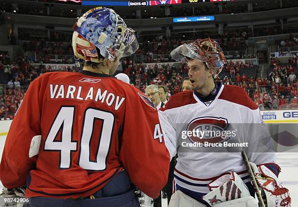 Jaroslav Halak of the Montreal Canadiens shakes hands with Semyon Varlamov of the Washington Capitals following the Canadiens 2-1 win in Game Seven...