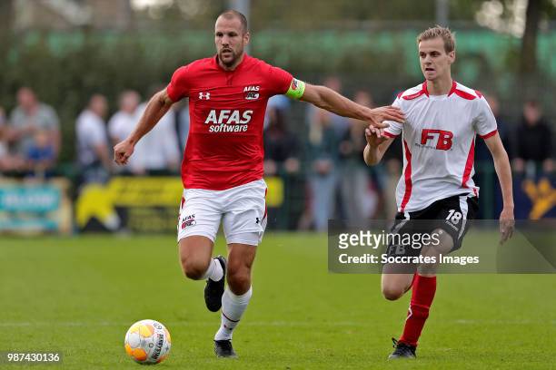 Ron Vlaar of AZ Alkmaar, Remco Reinhard of vv Dirkshorn during the match between Regioselectie Dirkshorn v AZ Alkmaar at the Sportpark Dirkshorn on...