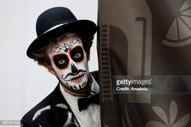 Participant attends event The day of the Dead at the Moscow Gostiny Dvor in Moscow , Russia on June 30 2018.