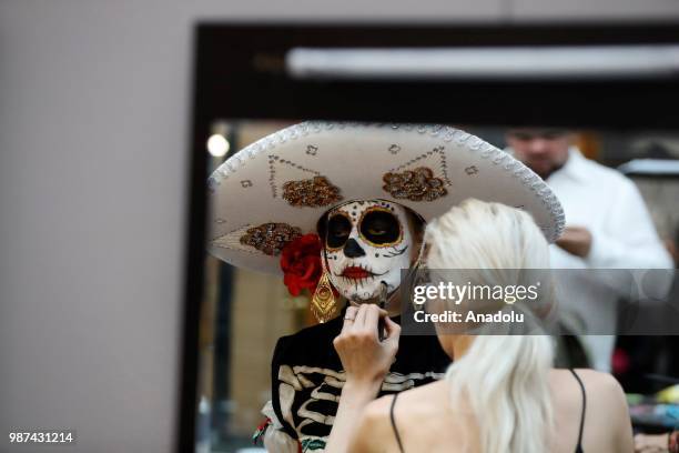 Participant attends event The day of the Dead at the Moscow Gostiny Dvor in Moscow , Russia on June 30 2018.