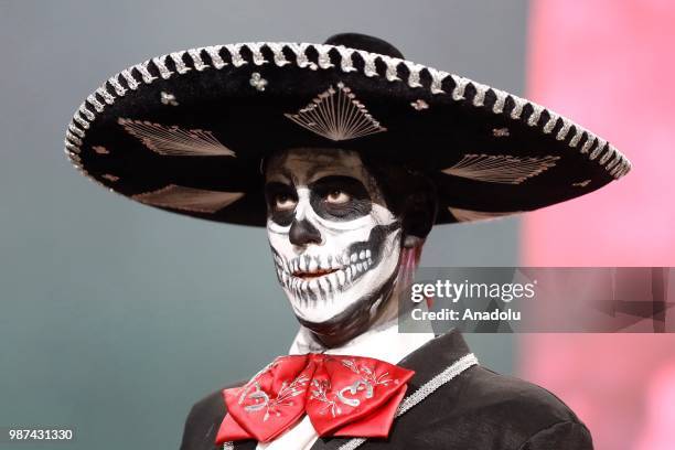 Participant attends event The day of the Dead at the Moscow Gostiny Dvor in Moscow , Russia on June 30 2018.