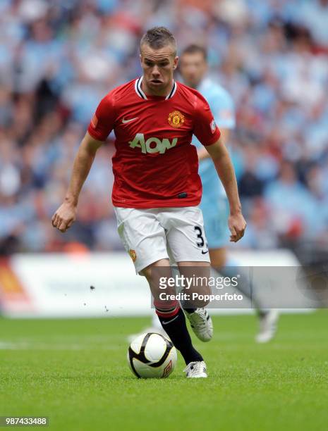 Tom Cleverley of Manchester United in action during the FA Community Shield match between Manchester City and Manchester United at Wembley Stadium in...