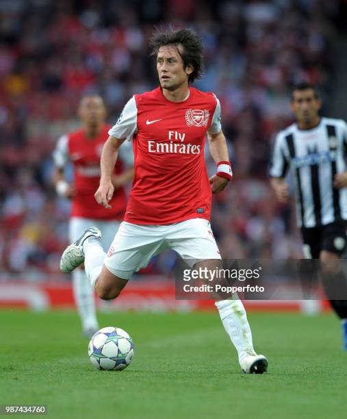 Tomas Rosicky of Arsenal in action during the UEFA Champions League play-off first leg match between Arsenal and Udinese at the Emirates Stadium in...