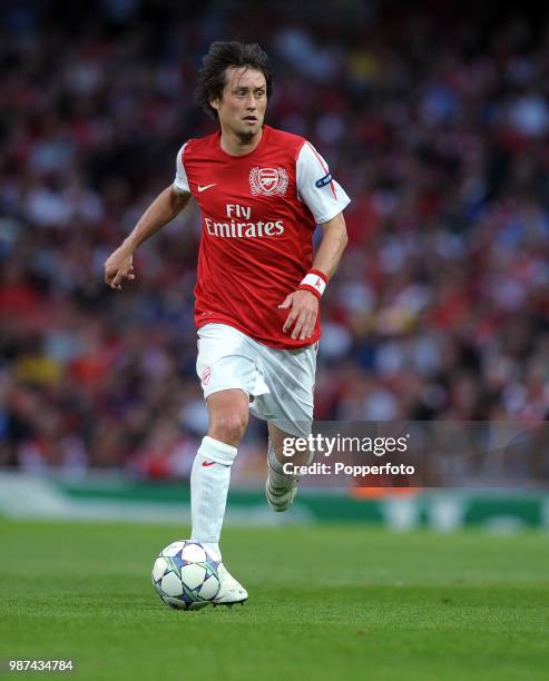 Tomas Rosicky of Arsenal in action during the UEFA Champions League play-off first leg match between Arsenal and Udinese at the Emirates Stadium in...
