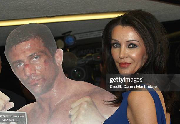 Yvette Rowland with an Alex Reid poster attends the UK Film Premiere of 'Killer Bitch' on April 29, 2010 in London, England.