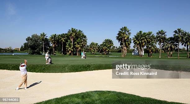 Darren Clarke of Northern Ireland on the par four 18th hole during the first round of the Open de Espana at the Real Club de Golf de Seville on April...