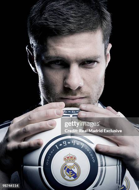 Xabi Alonso of Real Madrid poses during a photo session at the Bernabeu Stadium on November 26, 2010 in Madrid, Spain.