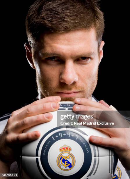 Xabi Alonso of Real Madrid poses during a photo session at the Bernabeu Stadium on November 26, 2010 in Madrid, Spain.