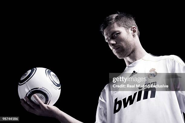 Xabi Alonso of Real Madrid poses during a photo session at the Bernabeu Stadium on November 26, 2010 in Madrid, Spain.