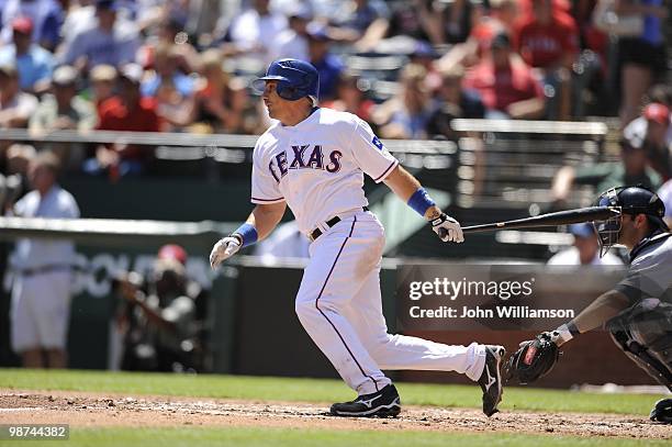 Matt Treanor of the Texas Rangers bats during the game against the Detroit Tigers at Rangers Ballpark in Arlington in Arlington, Texas on Sunday,...
