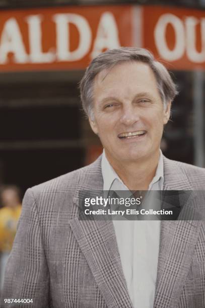 American actor and writer Alan Alda posed outside the Shaftesbury Theatre in London, where he is starring in the Thornton Wilder play 'Our Town',...
