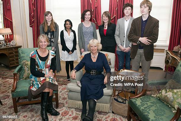 Camilla, Duchess of Cornwall during a meeting with members of the Orange Prize Youth Panel, back row: Hazel Compton 19 from Norfolk, Pooja Gohil 17...