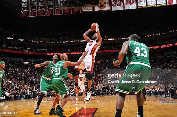 Udonis Haslem of the Miami Heat shoots over Ray Allen of the Boston Celtics in Game Three of the Eastern Conference Quarterfinals during the 2010 NBA...