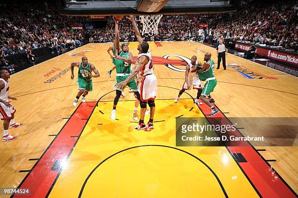 Rajon Rondo of the Boston Celtics against goes up for a shot against Udonis Haslem of the Miami Heat in Game Three of the Eastern Conference...