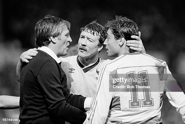 Oxford United captain Malcolm Shotton with referee Keith Hackett and Queens Park Rangers' Michael Robinson during the Football League Milk Cup Final...