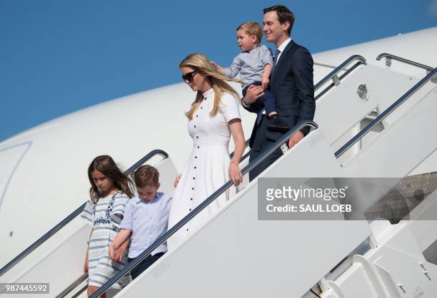 White House Senior Advisers Jared Kushner and Ivanka Trump disembark from Air Force One with their children upon arrival at Morristown Municipal...