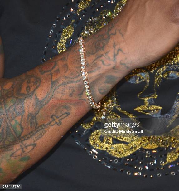 Rapper Flo Rida, bracelet detail, attends a memorabilia case dedication at the Hard Rock Hotel & Casino on June 29, 2018 in Las Vegas, Nevada.