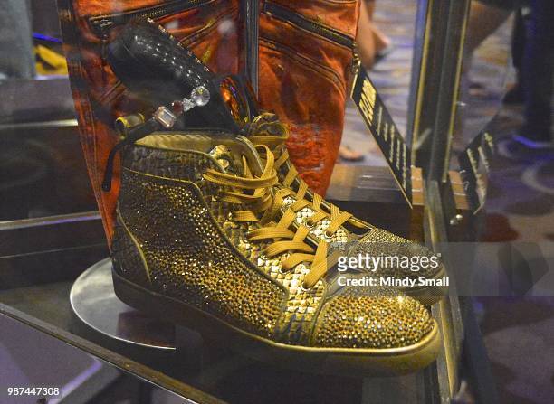 Christian Louboutin sneakers are displayed during the Flo Rida memorabilia case dedication at the Hard Rock Hotel & Casino on June 29, 2018 in Las...