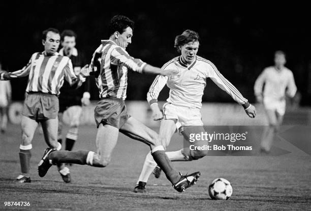 Dynamo Kiev striker Oleg Blokhin is challenged by Athletico Madrid defender Miguel Angle Ruiz during the European Cup Winners Cup Final match held at...