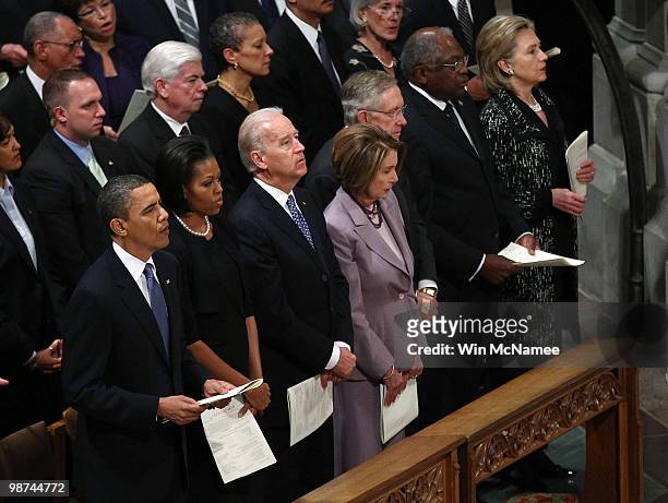 President Barack Obama attends the funeral service for civil rights leader Dorothy Height with first lady Michelle Obama, U.S. Vice President Joe...