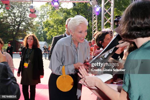 Emma Thompson signs autographs to her fans at the Cine Merit Award Gala during the Munich Film Festival 2018 at Gasteig on June 29, 2018 in Munich,...