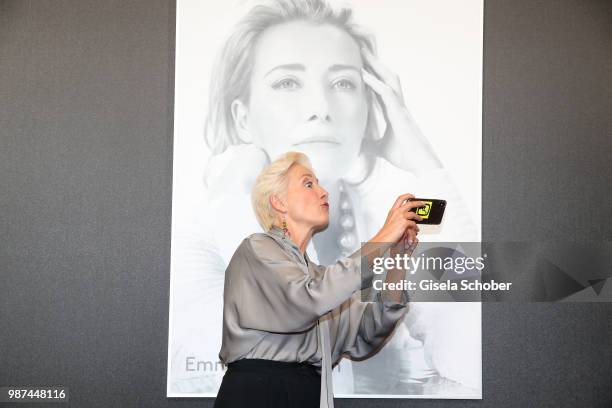 Emma Thompson takes a funny selfie at her photo at the Cine Merit Award Gala during the Munich Film Festival 2018 at Gasteig on June 29, 2018 in...