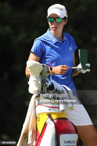 Carlota Ciganda of Spain looks at her yardage book on the 17th tee during the second round of the 2018 KPMG PGA Championship at Kemper Lakes Golf...