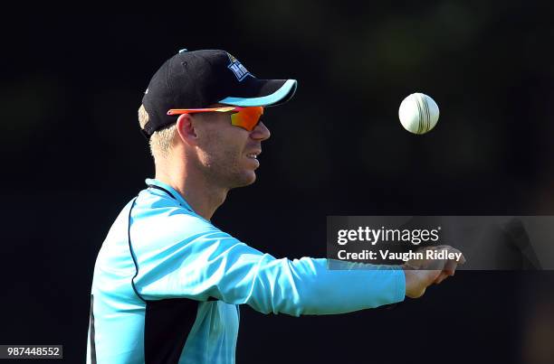David Warner of Winnipeg Hawks spins at the ball during a Global T20 Canada match against Montreal Tigers at Maple Leaf Cricket Club on June 29, 2018...