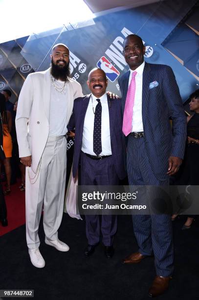 Tyson Chandler of the Phoenix Suns, John Lucas II and Dikembe Mutombo pose for a portrait on the red carpet before the 2018 NBA Awards Show on June...