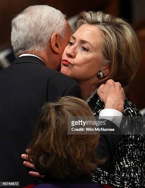 Secretary of State Hillary Clinton greets Sen. Orrin Hatch at the funeral service for civil rights leader Dorothy Height at the Washington National...