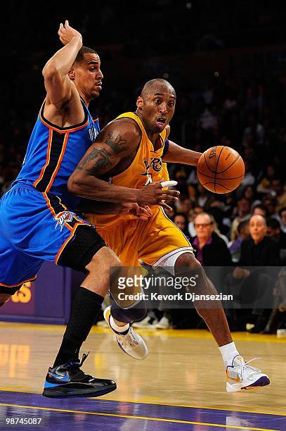 Kobe Bryant of the Los Angeles Lakers drives on Thabo Sefolosha of the Oklahoma City Thunder during Game Five of the Western Conference Quarterfinals...