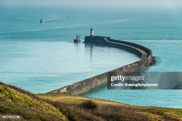 harbour arm, newhaven, england, united kingdom. - east sussex stock pictures, royalty-free photos & images