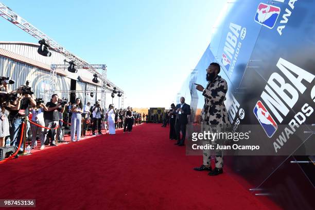 James Harden of the Houston Rockets walks the red carpet before the 2018 NBA Awards Show on June 25, 2018 at The Barkar Hangar in Santa Monica,...