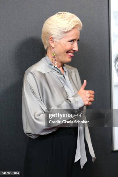 Emma Thompson in front of her photo at the Cine Merit Award Gala during the Munich Film Festival 2018 at Gasteig on June 29, 2018 in Munich, Germany.