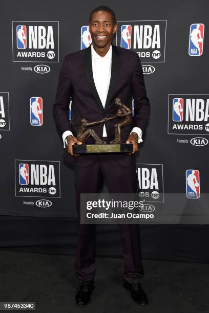 Jamal Crawford of the Minnesota Timberwolves poses for a photograph with his award during the 2018 NBA Awards Show on June 25, 2018 at The Barkar...