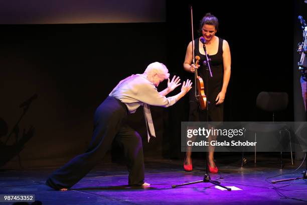 Emma Thompson sings barefoot on stage at the Cine Merit Award Gala during the Munich Film Festival 2018 at Gasteig on June 29, 2018 in Munich,...