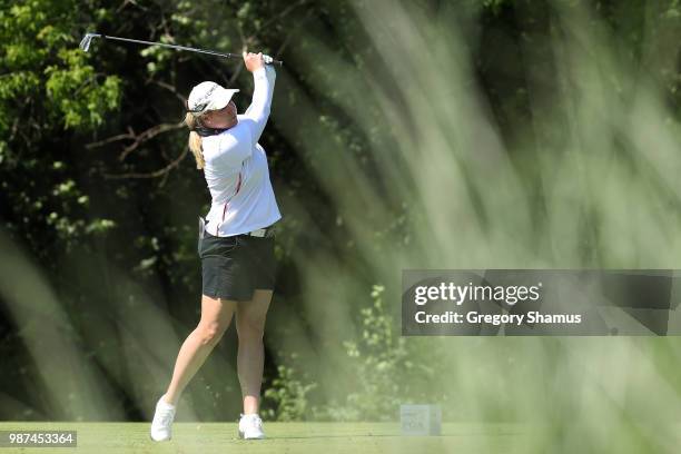 Brittany Lincicome watches her tee shot on the 17th hole during the second round of the 2018 KPMG PGA Championship at Kemper Lakes Golf Club on June...