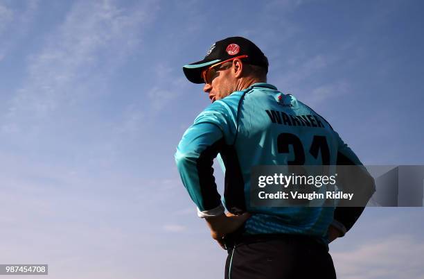 David Warner of Winnipeg Hawks plays near the boundary during a Global T20 Canada match against Montreal Tigers at Maple Leaf Cricket Club on June...