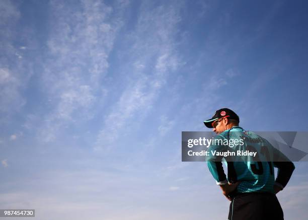 David Warner of Winnipeg Hawks plays near the boundary during a Global T20 Canada match against Montreal Tigers at Maple Leaf Cricket Club on June...