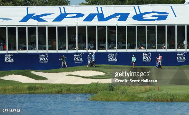 Stacy Lewis hits her third shot on the 18th hole during the second round of the KPMG Women's PGA Championship at Kemper Lakes Golf Club on June 29,...