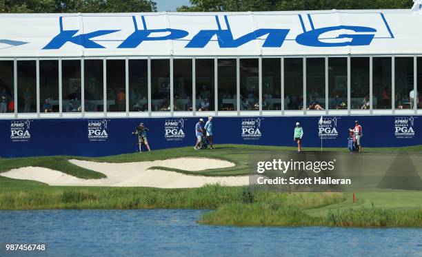 Stacy Lewis hits her third shot on the 18th hole during the second round of the KPMG Women's PGA Championship at Kemper Lakes Golf Club on June 29,...