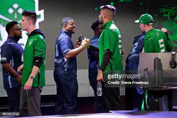 Mel East of Celtics Crossover Gaming shakes hands with Winner_Stayz_On of Grizz Gaming on June 23, 2018 at the NBA 2K League Studio Powered by Intel...