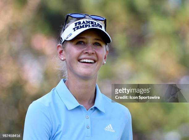 Jessica Korda smiles after playing her tee shot from the second hole during the second round of the KPMG Women's PGA Championship on June 29, 2018 at...